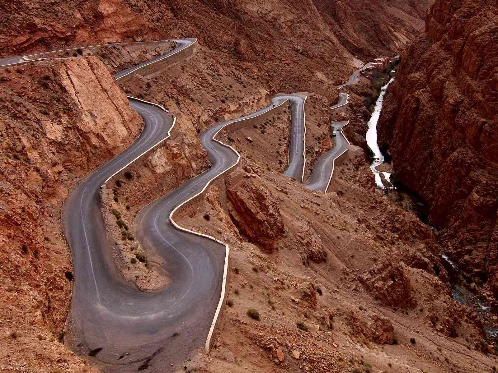 Navigate the serpentine roads of Dades Gorges on your desert tour from Marrakech to Merzouga.